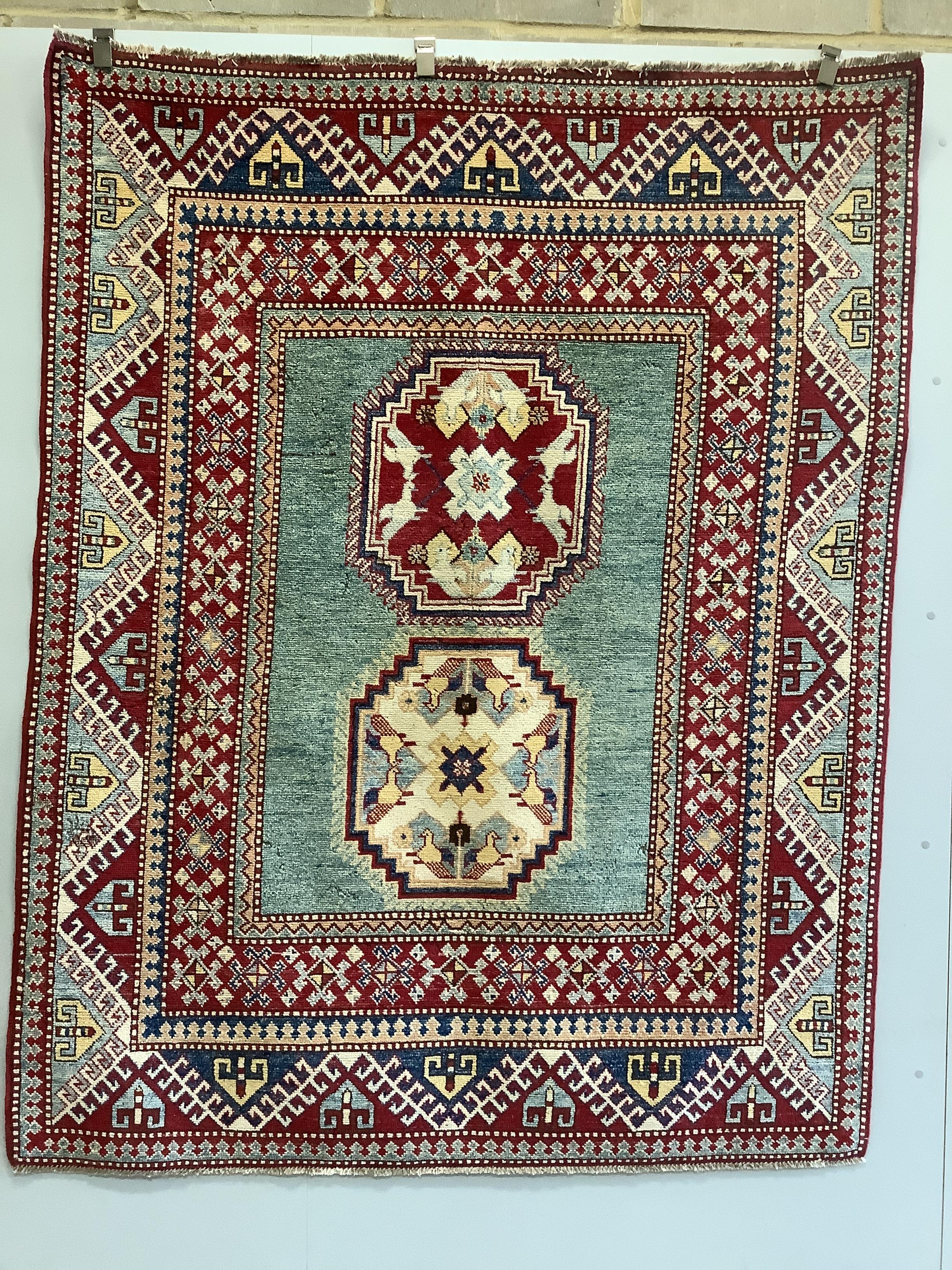Two Caucasian style rugs, larger 202 x 162cm